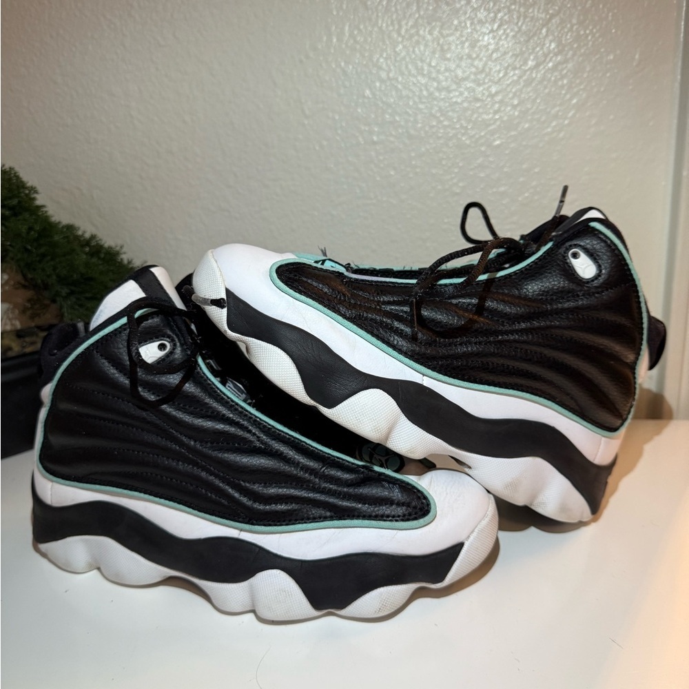 Nike jordan Black and White Sneakers with Green Accents
